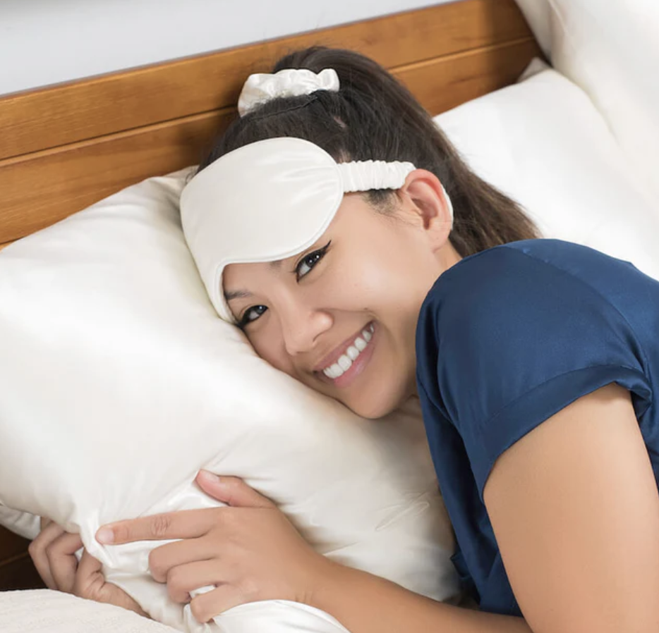 woman in bed with eyemask on