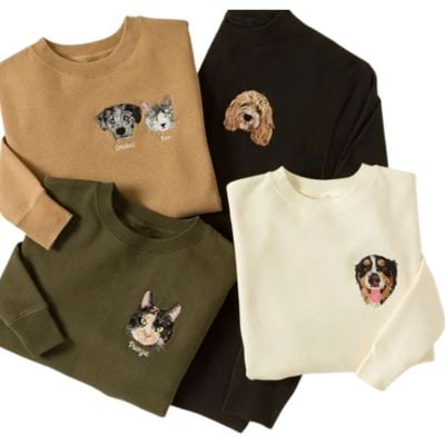 four sweatshirts with pet images on them