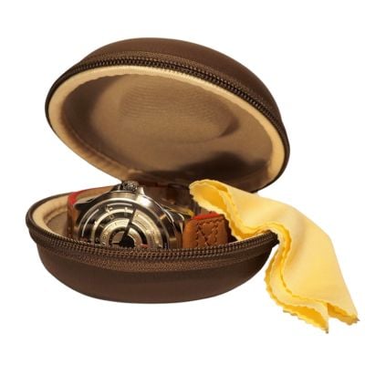 round brown case with watch in it