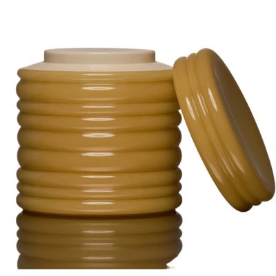 small yellow ribbed pot with lid off